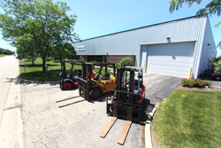 Lift trucks outside the Somerset Equipment Sales warehouse